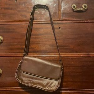 Small brown leather purse with adjustable strap
